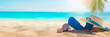 Leinwandbild Motiv Sunny tropical beach with turquoise water, summer holidays vacation background, seashells in sand, palm tree on the beach
