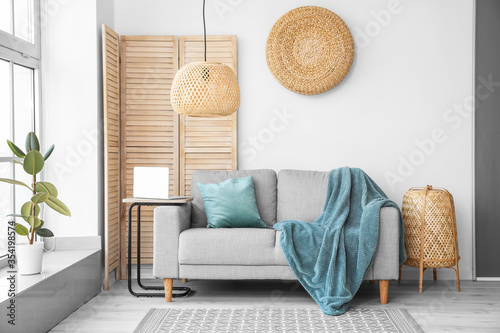 Stylish interior of living room with sofa Tableau sur Toile