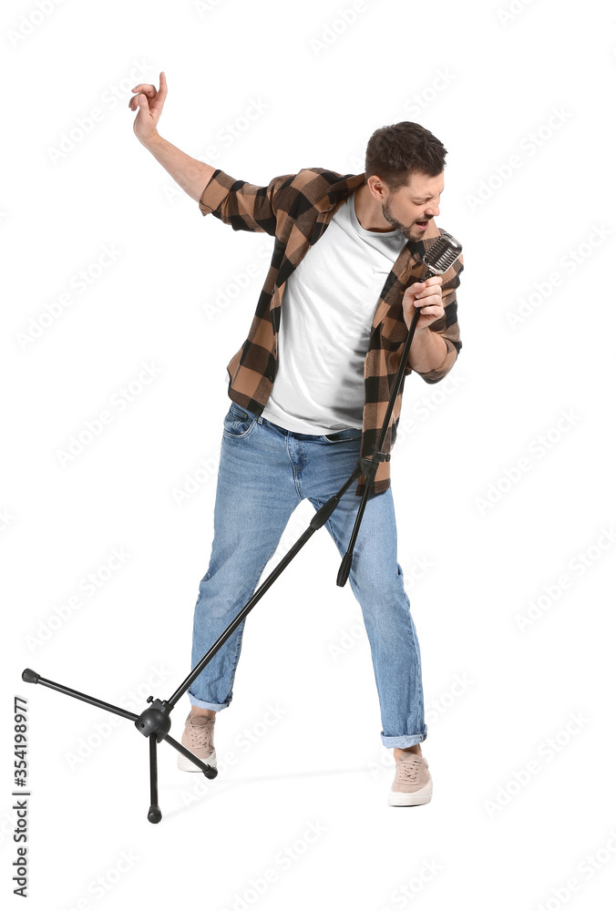 Handsome man singing against white background