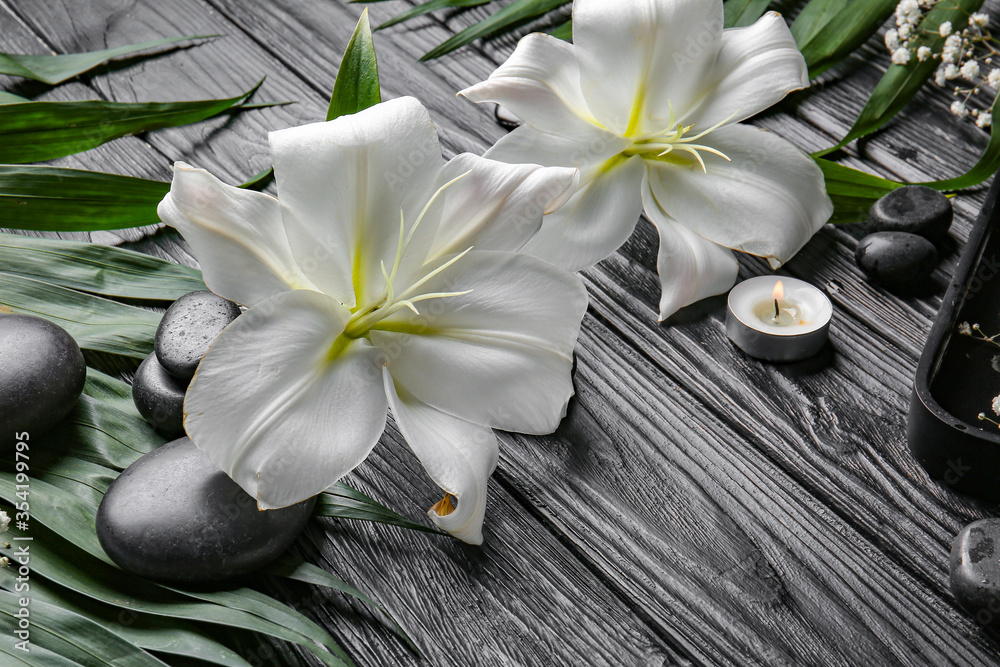 Beautiful spa composition on dark wooden background. Zen concept