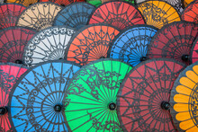 Group Of Colourful Myanmar Parasols Sell In Souvenir Shop.  The Pathein Parasol For One Is Simply Enchanting, With Its Beautiful Design Containing Sort Of Artistic Paintings On Them.