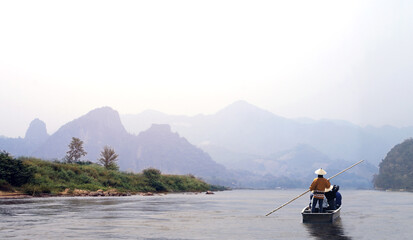 Wall Mural - People boating in Mekong river, Laos