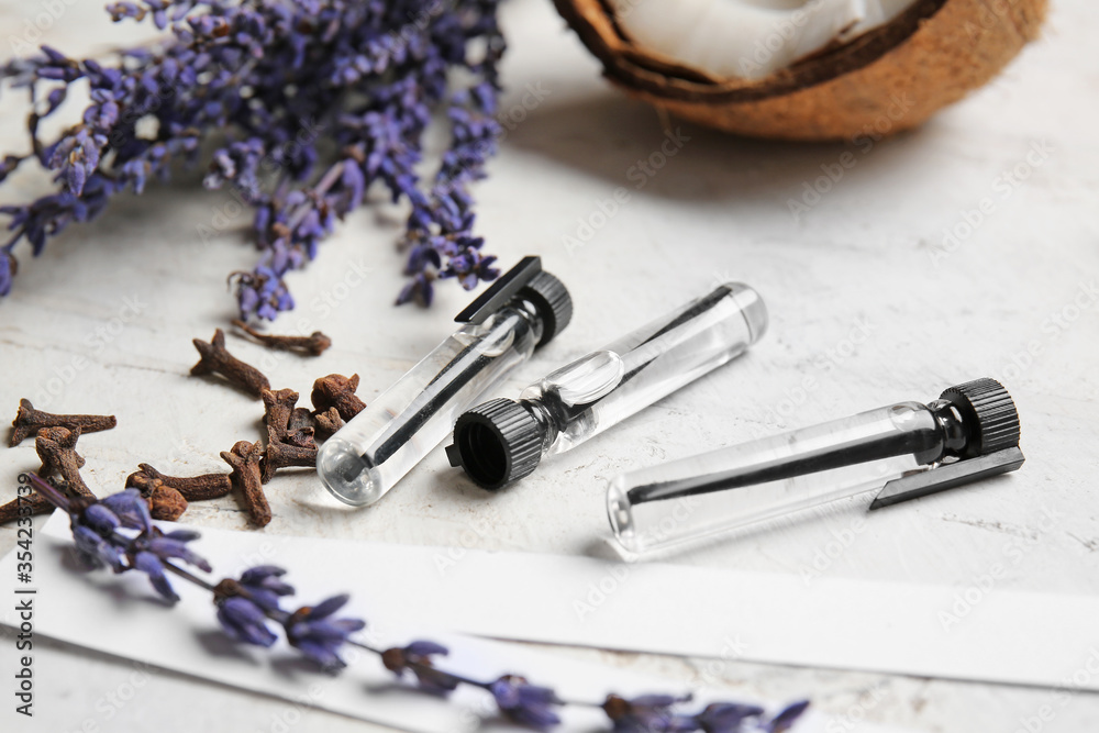 Perfume samples on light background