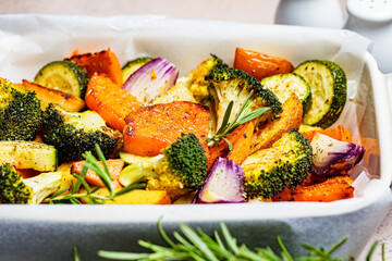 Wall Mural - Baked vegetables in the oven dish. Grilled sweet potato, zucchini and broccoli. Healthy vegan food concept.