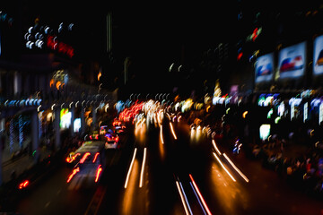 Wall Mural - Abstract city blur background with bokeh lights at Night city street Bangkok Thailand lights bokeh background