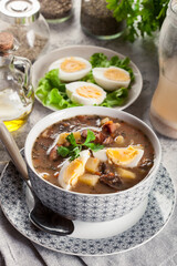 Poster - The sour soup made of rye flour with mushrooms served with eggs