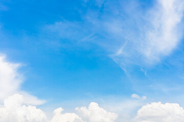 Wall Mural - fluffy cloud against blue sky background for summer and nature concept