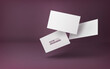 Three white business cards on a burgundy background in space. Vector illustration. 3d template for design visualization.
