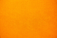 Bright Solid Color Background. Empty Orange Surface With Fine Texture. Preparation For Designer Or Layout