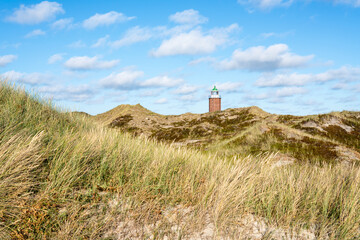 Wall Mural - rotes kliff lighthouse on the island of sylt, schleswig-holstein, germany