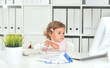© aletia2011 - Cute little girl using phone in office