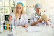 © pigprox - Two scientists are examining the skull in the laboratory.