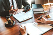 © joyfotoliakid - Judges male lawyers Consultation of businessmen legal services Consulting in regard to the various contracts to plan the case in court.