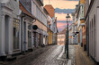 A beautiful colorful street at sunset in Viborg, Denmark. Beautiful city street in Denmark. Denmark cityscape at dusk. Scandinavian street at sunset. Viborg is one of the oldest cities in Denmark