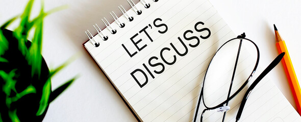 Poster - Notebook with glasses and pencil on white background, business concept LET'S DISCUSS