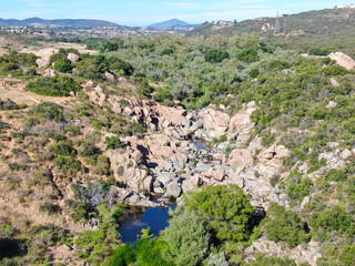 Poster - Aerial view of Los Penasquitos Canyon Preserve with the creek waterfall and people enjoying the water. Urban park with trails and river in San Diego, California. USA