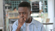 © stockbakers - Portrait of Sick Young African Man Coughing, Allergy