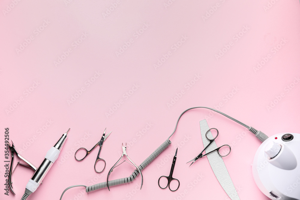 Supplies for manicure on color background