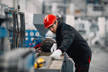 Wall Mural - Portrait of worker in factory.	