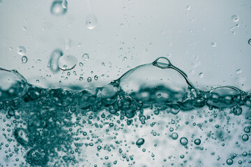 Background of close-up soda bubbles or pure water on white background.