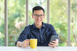 © ChompopsonG - Business employee enjoy and happy to work at company office with positive attitude.
