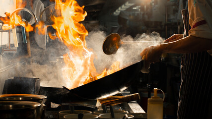 Wall Mural - Chef stir fry cooking