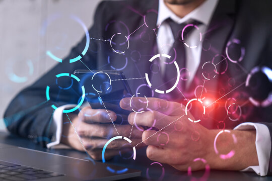 Businessman using app on phone. Abstract technology icons hologram. Multiexposure. People connection concept.