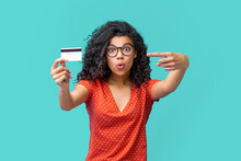 Studio Portrait Of Happy Attractive Young African American Woman In Trendy Spectacles Smiling And Holding Credit Card In Hand