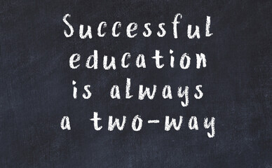 chalk inscription of smart quote on black desk