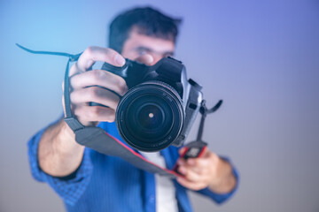 Wall Mural - photographer hand camera in studio