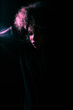© Dmytro - A creatively processed photo of a beautiful Afro-American girl with curly hair who poses in the studio on a dark background.