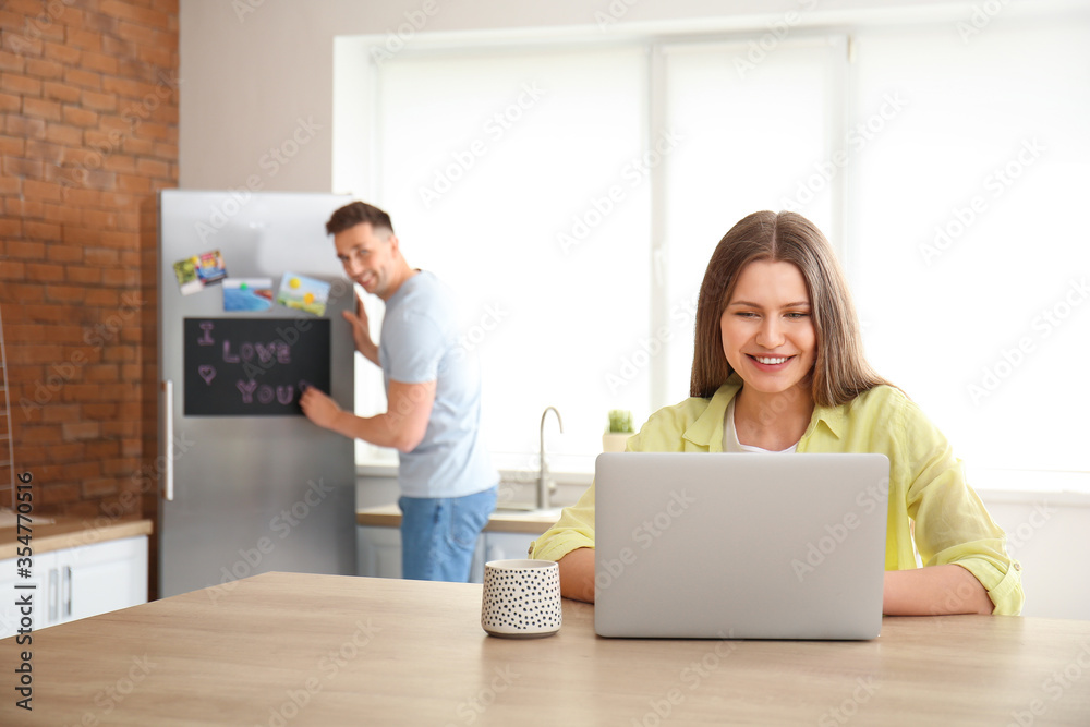 Young couple resting in kitchen