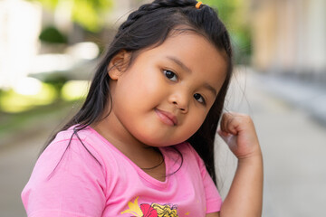 Close-up of a beautiful baby girl happiness shot outdoors, 4-5 year.