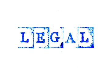 Sticker - Blue ink of rubber stamp in word legal on white paper background