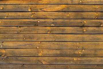 Wall Mural - Texture of a yellow fence made of wooden boards