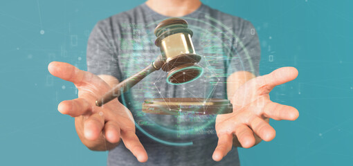 Poster - businessman holding a justice hammer and data - 3d rendering