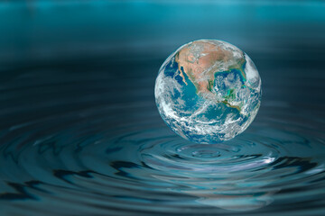 world dropping in a water drop ,concept for water pullation and conservative.elements of this image 