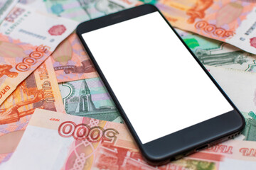 A black smartphone with a white screen lies on rubles. Russian money. mockup