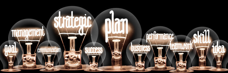Wall Mural - Light Bulbs with Strategic Plan Concept