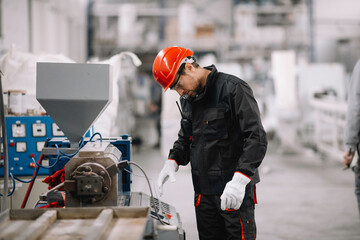 Wall Mural - Portrait of worker in factory.