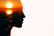 © primipil - Woman head silhouette with sun inside with copy space. Multiple exposure image.