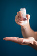© Ivan Yohan - Healthcare: Applying Hand Sanitizer