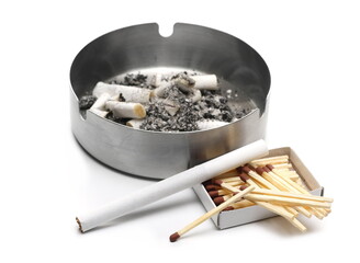 Wall Mural - Ashtray with cigarette stubs, butts and fire matches in carton box isolated on white background