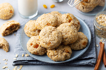 Healthy vegan oat cookies. Grey background. Close up.