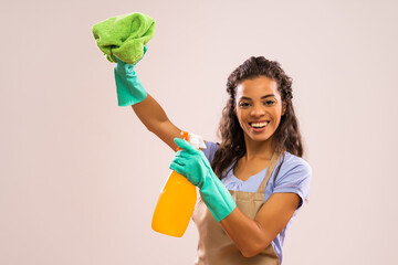 Wall Mural - Portrait of happy and successful african-american housewife who is ready for housework.