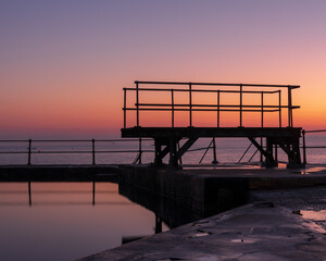 Wall Mural - Sunrise at the pier in Guernsey