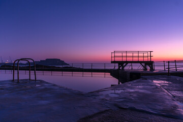 Wall Mural - Sunrise at the pier in Guernsey