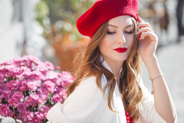 Very attractive young woman outdoors. Close up portrait of lovely lady