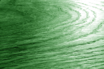 Wall Mural - Wooden board texture with blur effect in green tone.