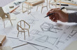 © Chaosamran_Studio - Designer sketching drawing design development product plan draft chair armchair Wingback Interior furniture prototype manufacturing production. designer studio concept .